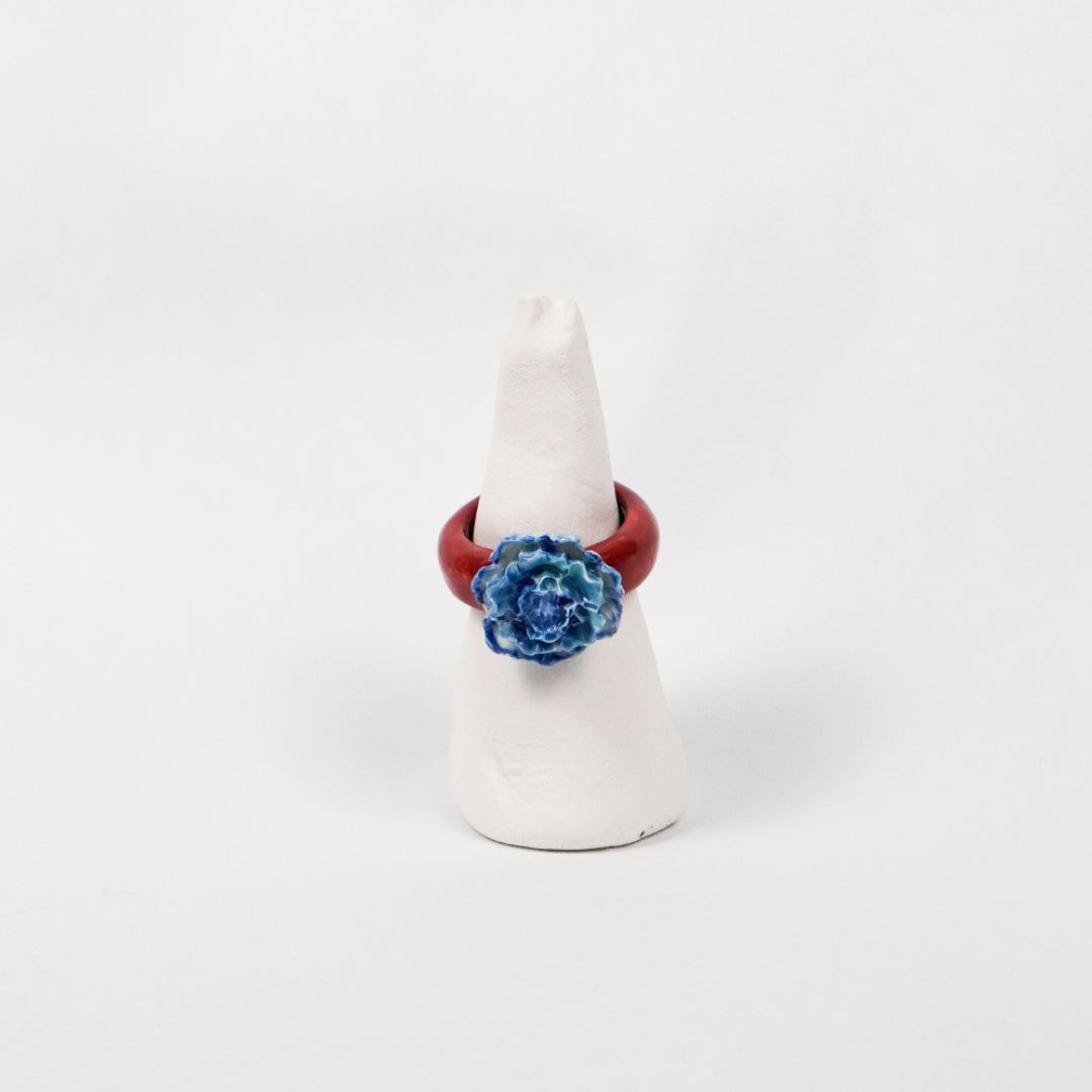 blue-peony-ceramic-ring-Leap-And-Linger-Product-Rings-by-Nomi-Bui-With-Stand-1st-Angle