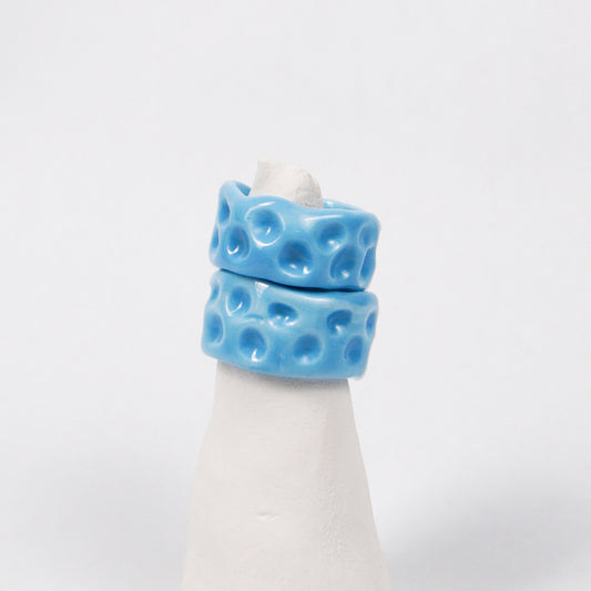 milky-way-uranus-ceramic-ring-Leap-And-Linger-Product-Rings-by-Nomi-Bui-With-Stand-2nd-Angle