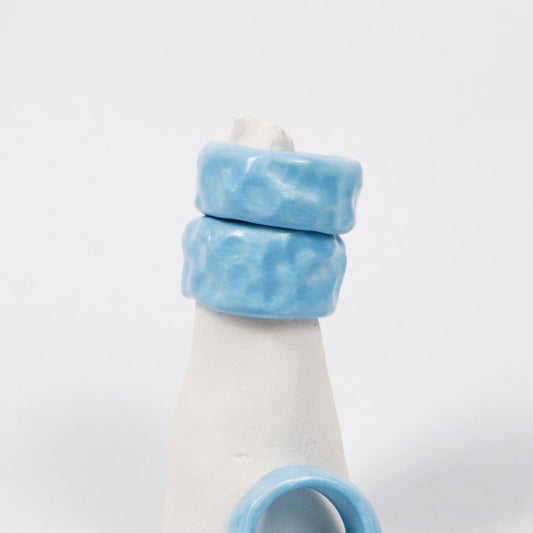 peace-blue-elixir-ceramic-ring-Leap-And-Linger-Product-Rings-by-Nomi-Bui-With-Stand-2nd-Angle