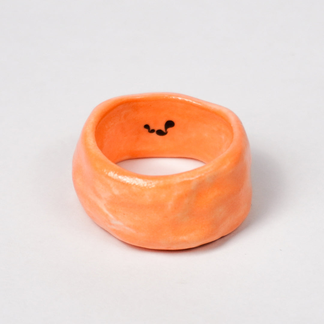 peace-vibrant-orange-ceramic-ring-Leap-And-Linger-Product-Rings-by-Nomi-Bui-1st-Angle