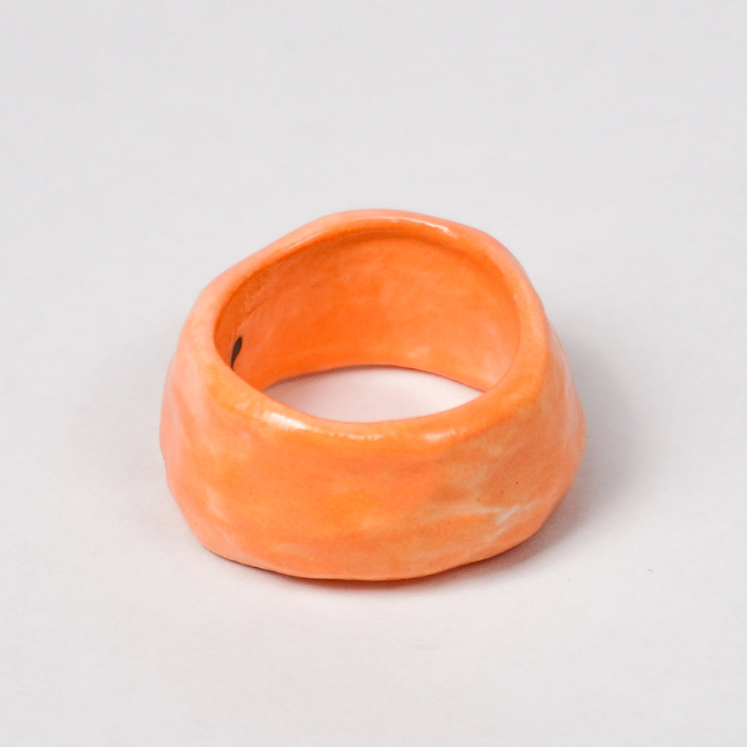 peace-vibrant-orange-ceramic-ring-Leap-And-Linger-Product-Rings-by-Nomi-Bui-3rd-Angle