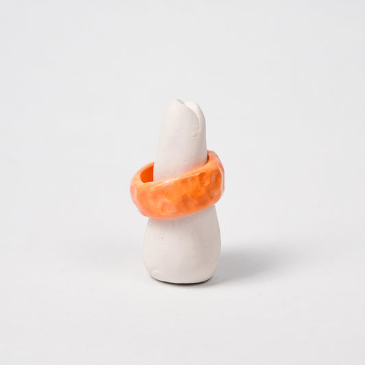peace-vibrant-orange-ceramic-ring-Leap-And-Linger-Product-Rings-by-Nomi-Bui-With-Stand-1st-Angle
