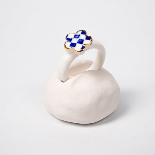 queen-s-gambit-legal-edition-with-24k-gold-ceramic-ring-Leap-And-Linger-Product-Rings-by-Nomi-Bui-With-Hand-1st-Angle