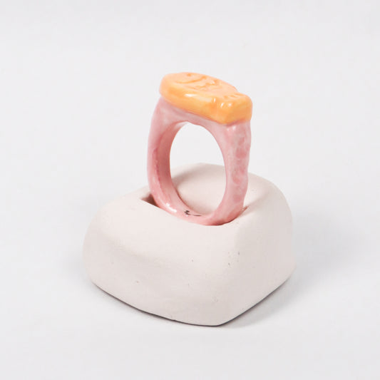 taiyaki-pink-marshmallow-ceramic-ring-Leap-And-Linger-Product-Rings-by-Nomi-Bui-With-Hand-1st-Angle