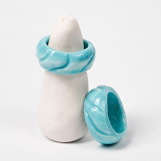 tires-aqua-sky-ceramic-ring-Leap-And-Linger-Product-Rings-by-Nomi-Bui-With-Stand-2nd-Angle