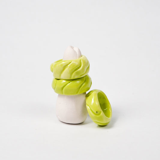 tires-wanderlust-green-ceramic-ring-Leap-And-Linger-Product-Rings-by-Nomi-Bui-With-Stand-2nd-Angle