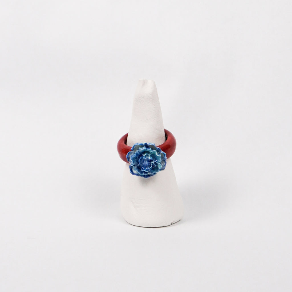 blue-peony-ceramic-ring-Leap-And-Linger-Product-Rings-by-Nomi-Bui-With-Stand-1st-Angle