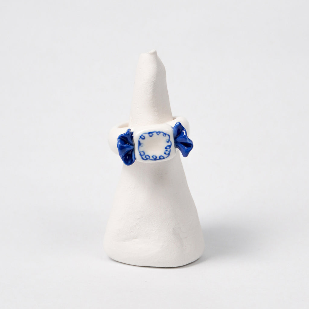 call-me-sweet-candy-ceramic-ring-Leap-And-Linger-Product-Rings-by-Nomi-Bui-With-Stand-1st-Angle