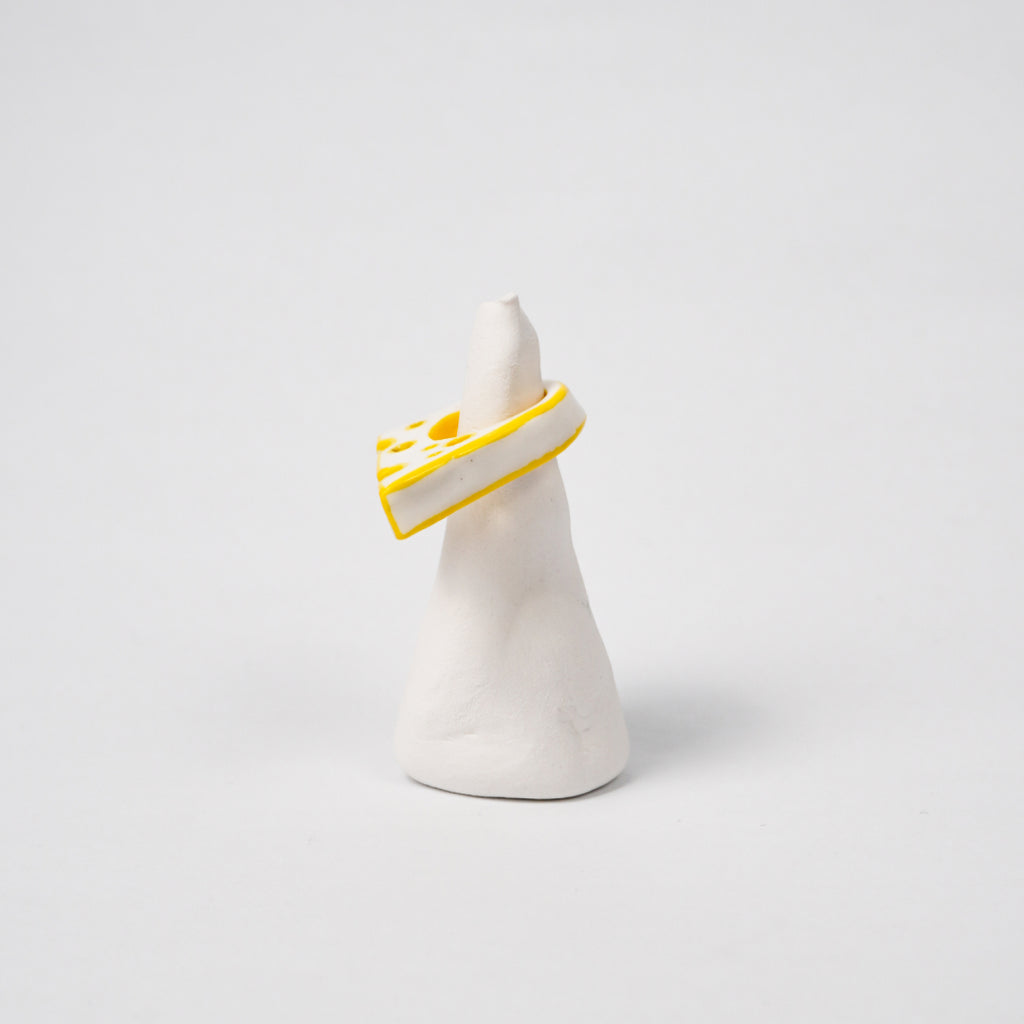 cheese-daughter-drawing-ceramic-ring-Leap-And-Linger-Product-Rings-by-Nomi-Bui-With-Stand-2nd-Angle
