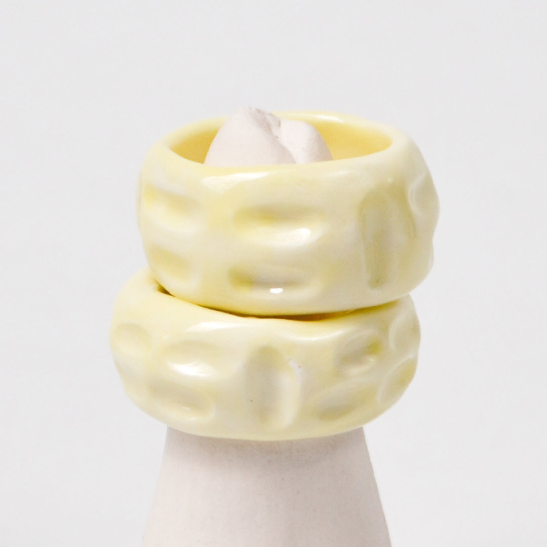 life-journey-creamy-dreams-truck-ceramic-ring-Leap-And-Linger-Product-Rings-by-Nomi-Bui-With-Hand-1st-Angle