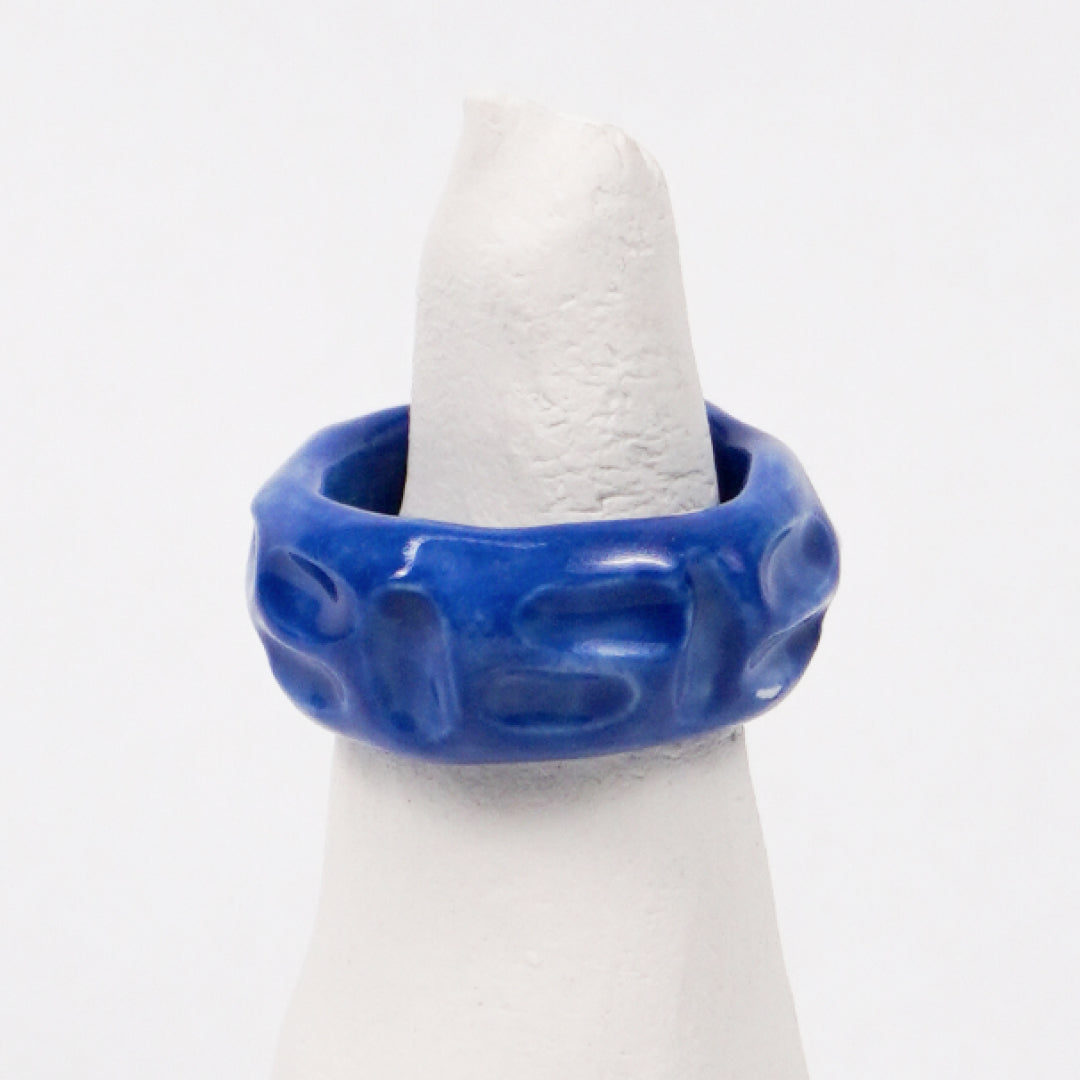 life-journey-deep-blue-lake-ceramic-ring-Leap-And-Linger-Product-Rings-by-Nomi-Bui-With-Stand-2nd-Angle