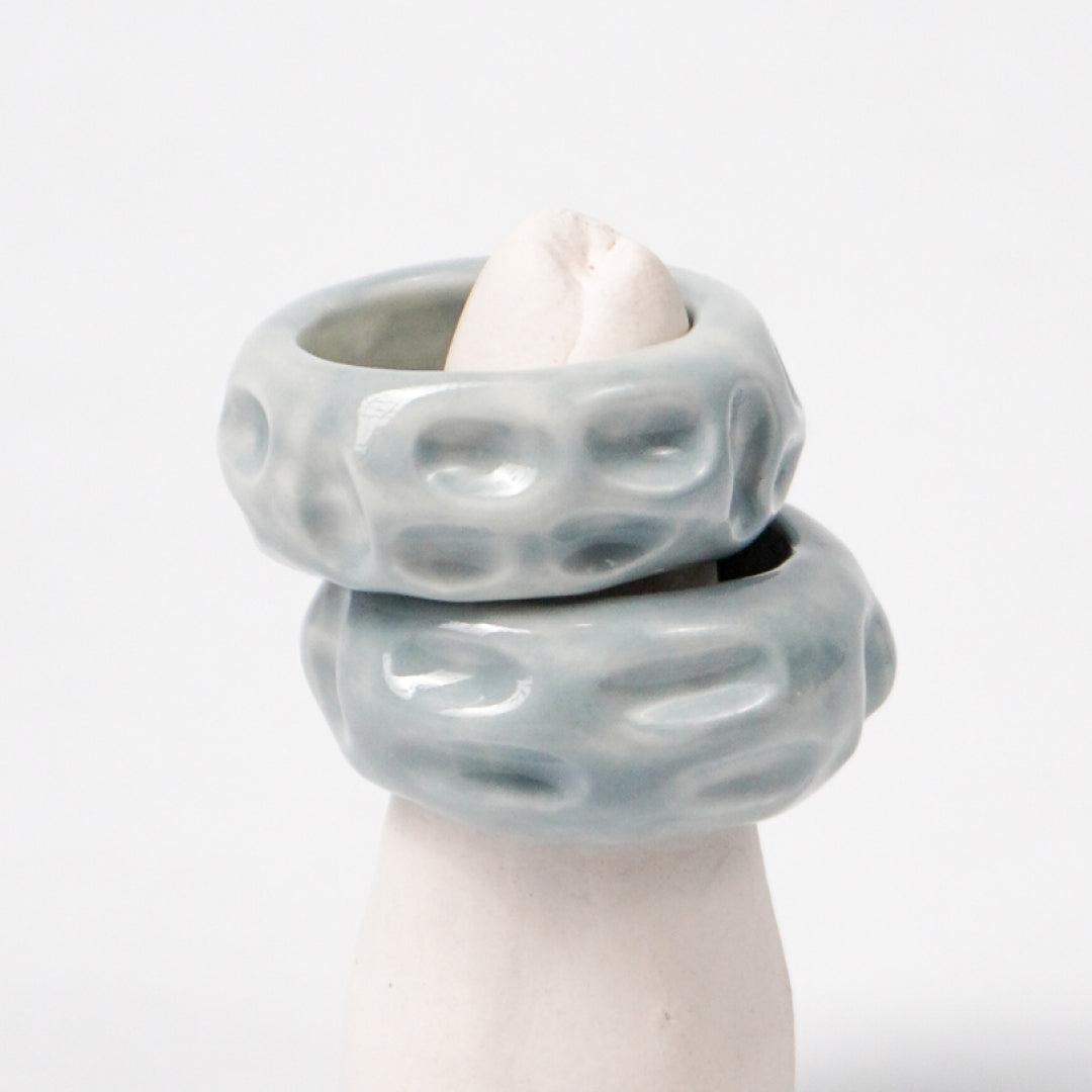life-journey-gray-clouds-porcelain-ring-Leap-And-Linger-Product-Rings-by-Nomi-Bui-With-Stand-2nd-Angle