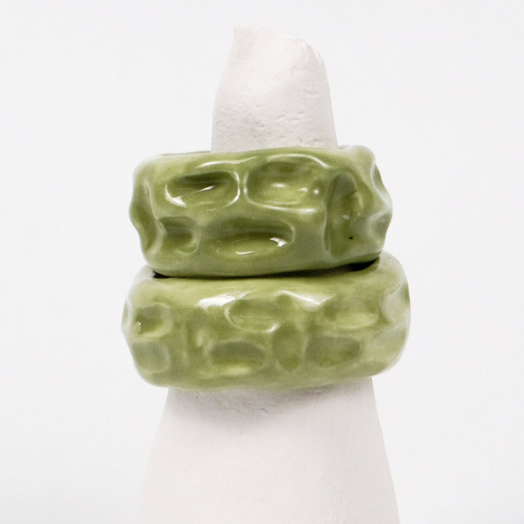 life-journey-under-the-green-trees-ceramic-ring-Leap-And-Linger-Product-Rings-by-Nomi-Bui-With-Stand-2nd-Angle