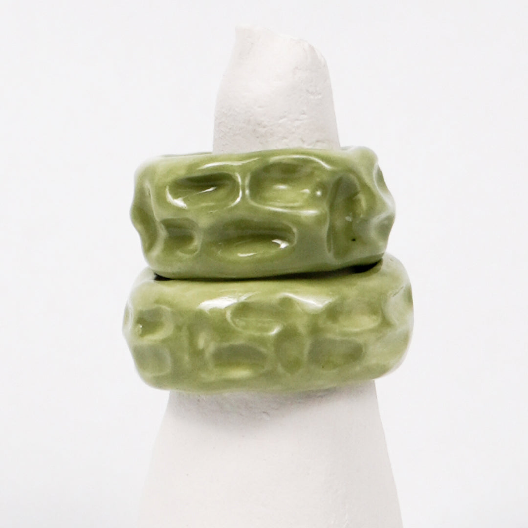 life-journey-under-the-green-trees-ceramic-ring-Leap-And-Linger-Product-Rings-by-Nomi-Bui-With-Stand-2nd-Angle