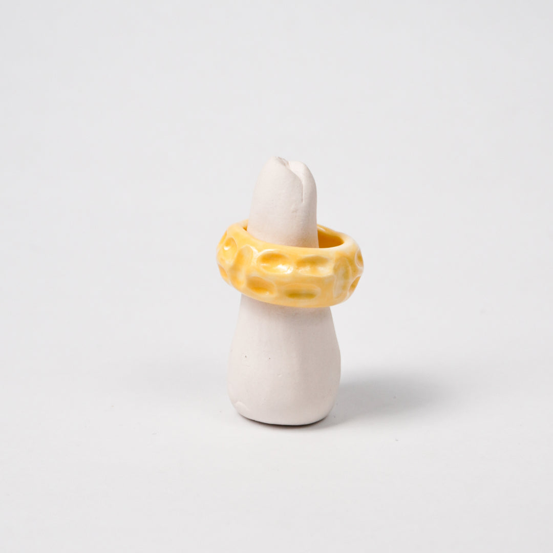 life-journey-yellow-mail-truck-ceramic-ring-Leap-And-Linger-Product-Rings-by-Nomi-Bui-With-Stand-1st-Angle