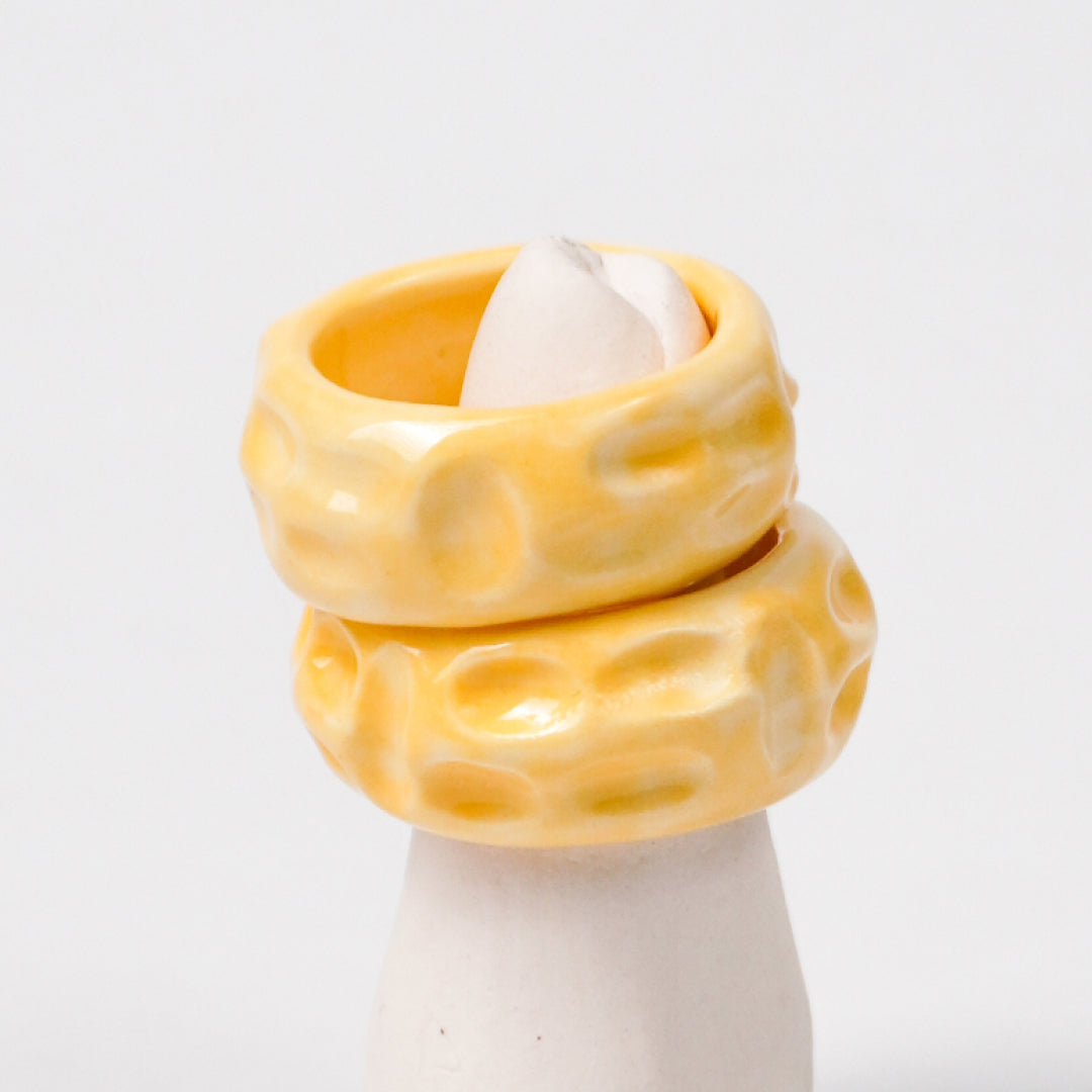 life-journey-yellow-mail-truck-ceramic-ring-Leap-And-Linger-Product-Rings-by-Nomi-Bui-With-Stand-2nd-Angle