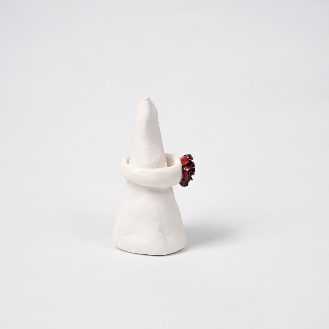 love-rosie-deep-love- porcelain-ring-clearance-ring-body-is-different-color-from-original-Leap-And-Linger-Product-Rings-by-Nomi-Bui-With-Hand-1st-Angle