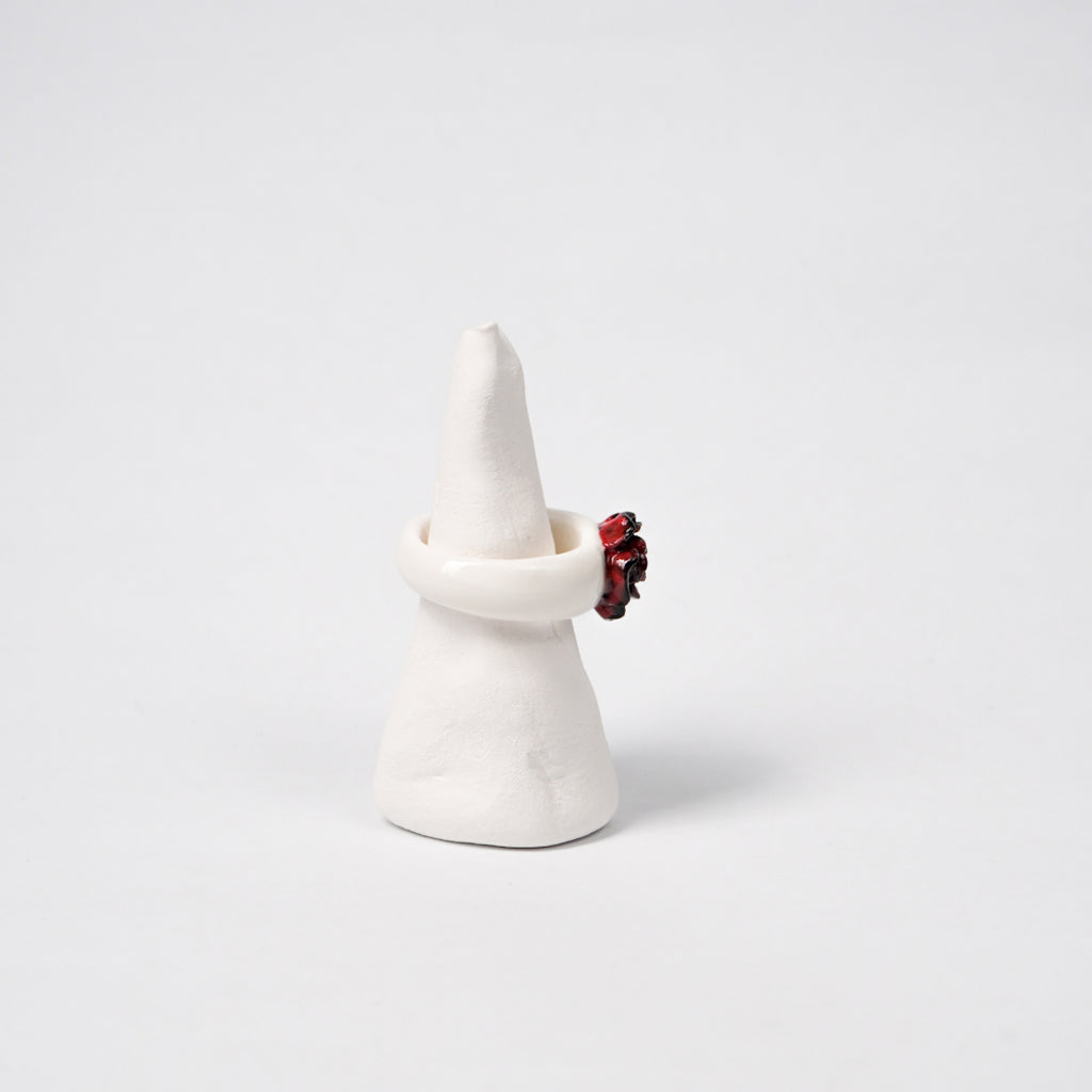 love-rosie-deep-love-ceramic-ring-clearance-ring-body-is-different-color-from-original-Leap-And-Linger-Product-Rings-by-Nomi-Bui-With-Hand-1st-Angle