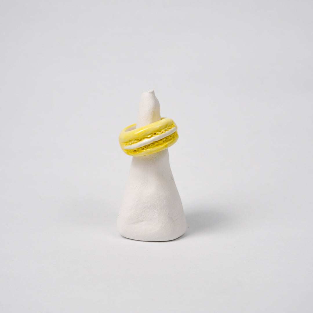 macaroon-lemon-flavor-ceramic-ring-Leap-And-Linger-Product-Rings-by-Nomi-Bui-With-Stand-1st-Angle