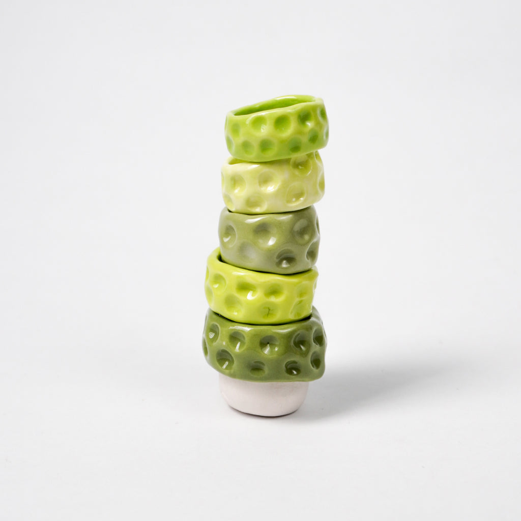 milky-way-aurora-ceramic-ring-Leap-And-Linger-Product-Rings-by-Nomi-Bui-With-Stand-2nd-Angle