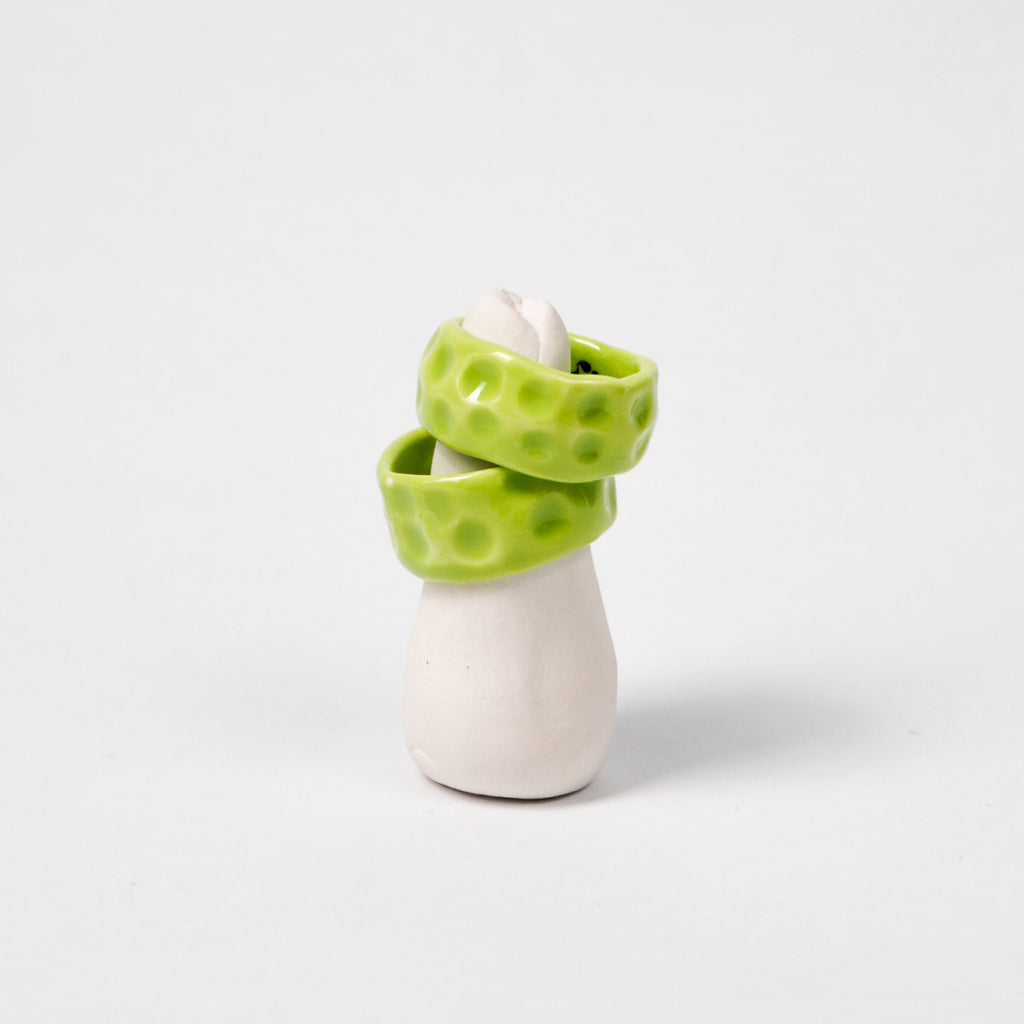 milky-way-green-pea-galaxie-porcelain-ring-Leap-And-Linger-Product-Rings-by-Nomi-Bui-With-Stand-2nd-Angle