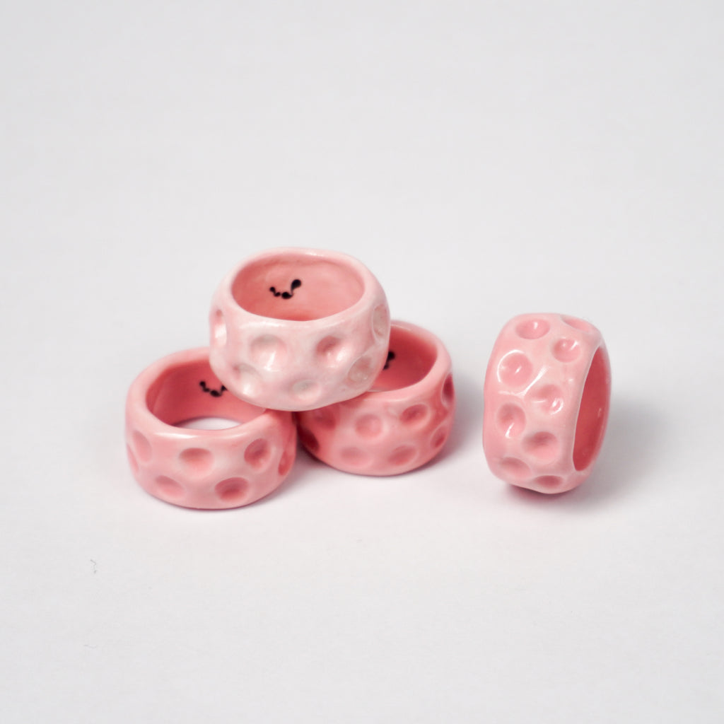 milky-way-rosette-nebula-ceramic-ring-Leap-And-Linger-Product-Rings-by-Nomi-Bui-With-Stand-1st-Angle