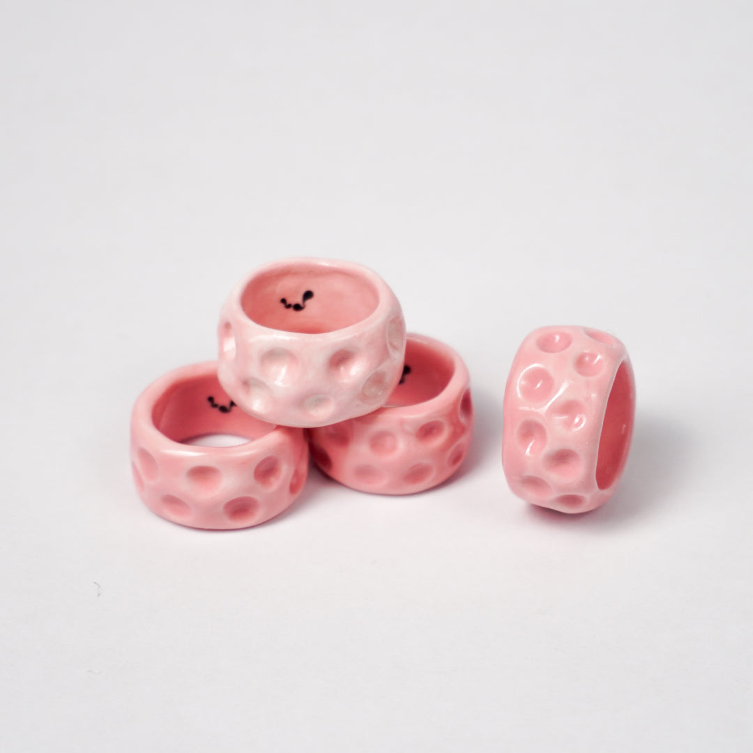 milky-way-rosette-nebula-ceramic-ring-Leap-And-Linger-Product-Rings-by-Nomi-Bui-With-Stand-1st-Angle