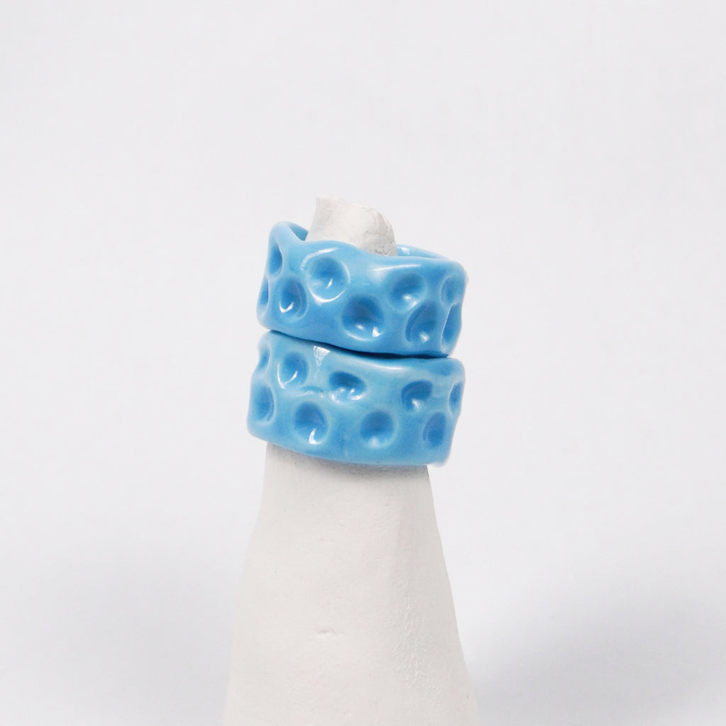 milky-way-uranus-pocerlain-ring-Leap-And-Linger-Product-Rings-by-Nomi-Bui-With-Stand-2nd-Angle