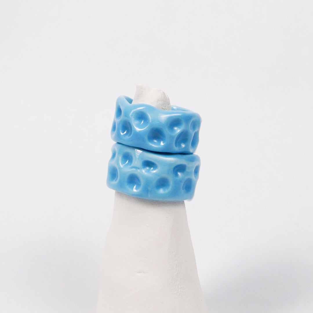 milky-way-uranus-pocerlain-ring-Leap-And-Linger-Product-Rings-by-Nomi-Bui-With-Stand-2nd-Angle
