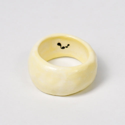 peace-awaken-yellow-ceramic-ring-clearance-slightly-imperfect-Leap-And-Linger-Product-Rings-by-Nomi-Bui-1st-Angle