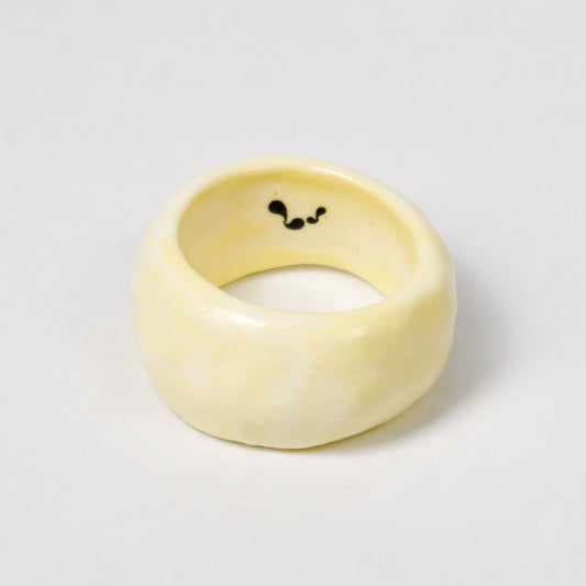 peace-awaken-yellow-ceramic-ring-clearance-slightly-imperfect-Leap-And-Linger-Product-Rings-by-Nomi-Bui-1st-Angle