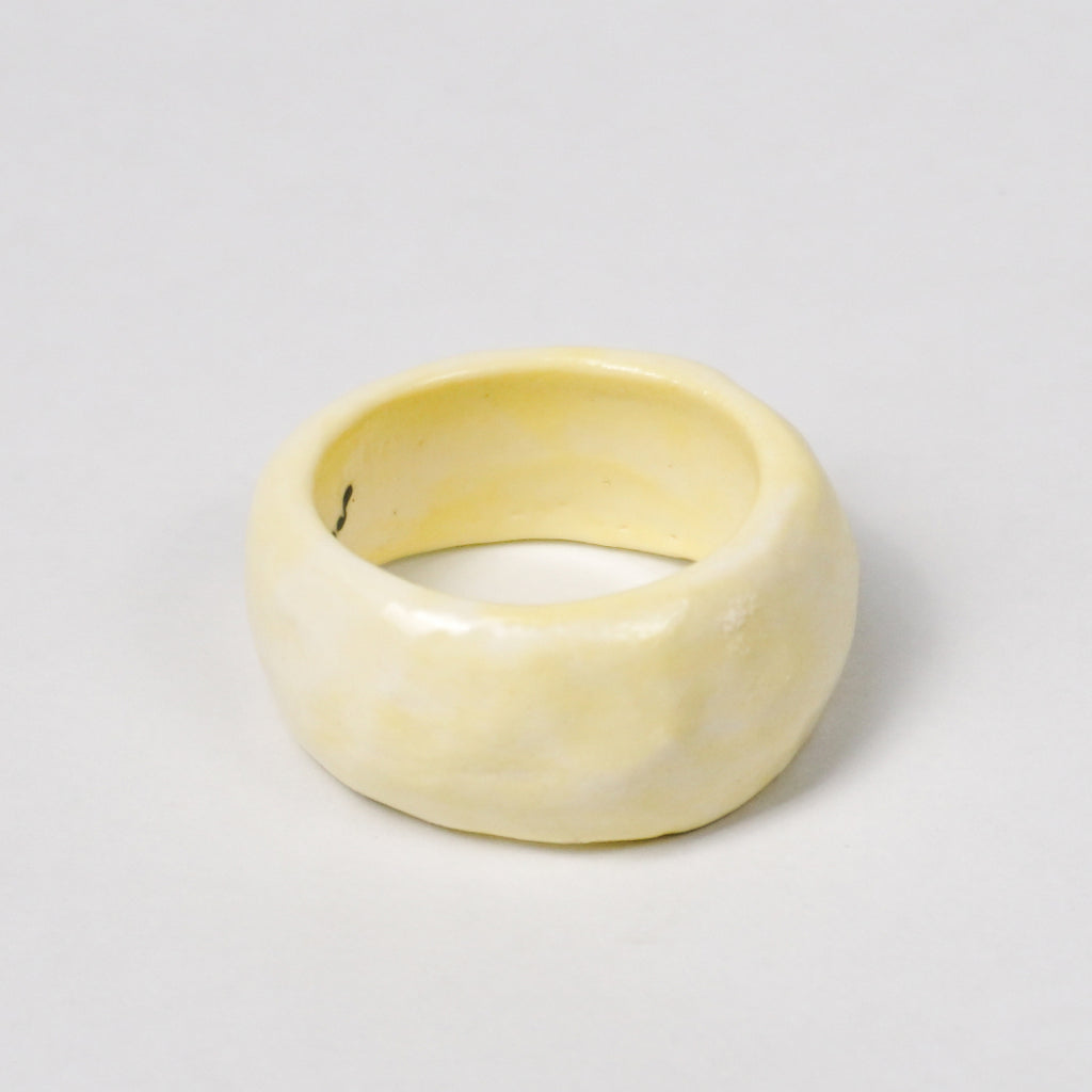 peace-awaken-yellow-ceramic-ring-clearance-slightly-imperfect-Leap-And-Linger-Product-Rings-by-Nomi-Bui-3rd-Angle