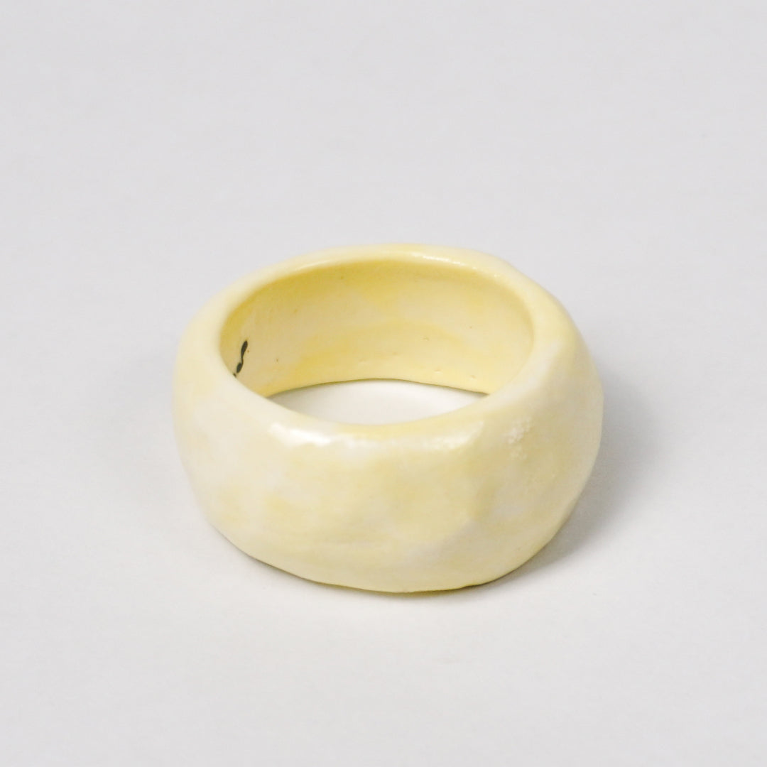 peace-awaken-yellow-porcelain-ring-clearance-slightly-imperfect-Leap-And-Linger-Product-Rings-by-Nomi-Bui-3rd-Angle