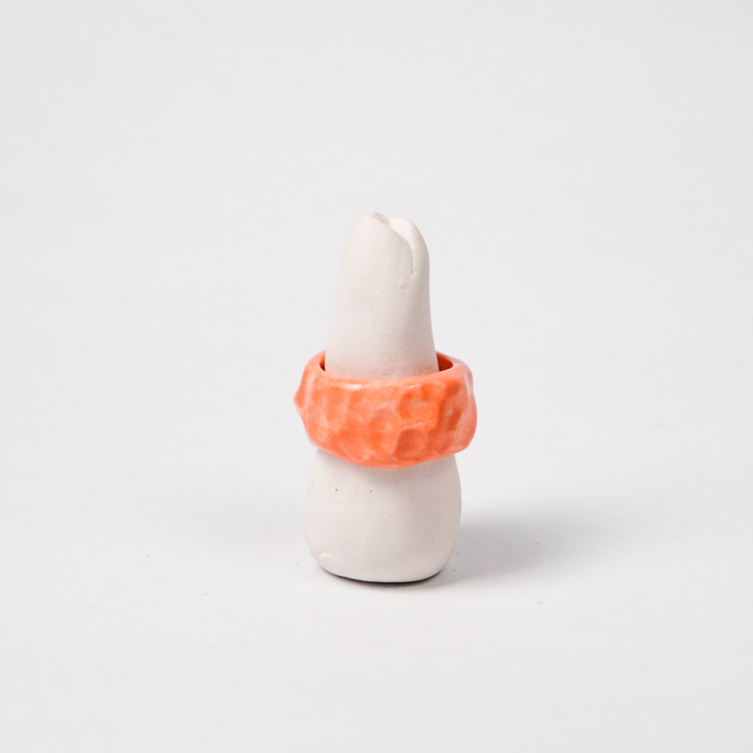 peace-blazing-orange-porcelain-ring-Leap-And-Linger-Product-Rings-by-Nomi-Bui-With-Stand-1st-Angle