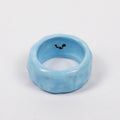 peace-blue-elixir-ceramic-ring-Leap-And-Linger-Product-Rings-by-Nomi-Bui-1st-Angle