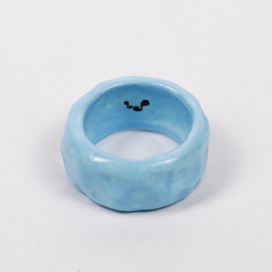 peace-blue-elixir-ceramic-ring-Leap-And-Linger-Product-Rings-by-Nomi-Bui-1st-Angle