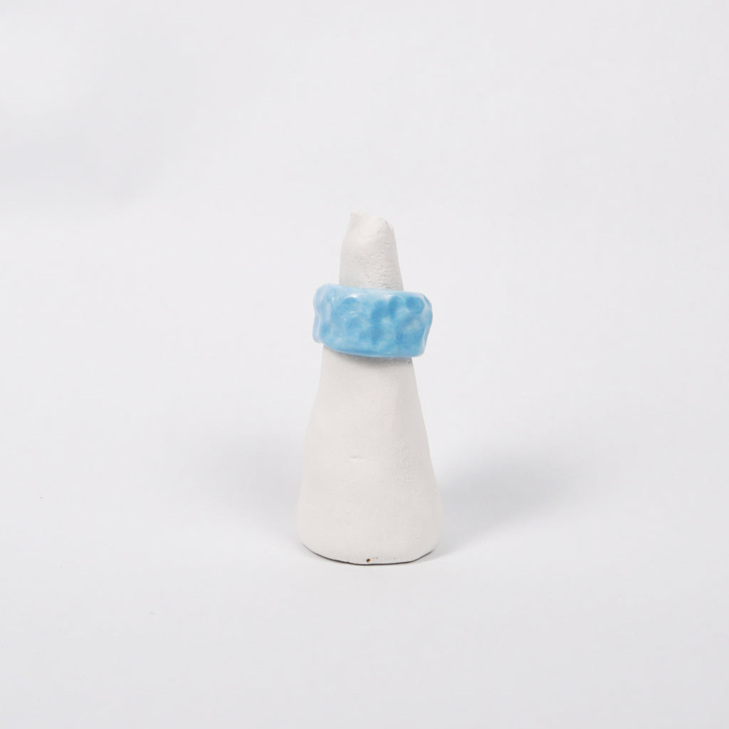 peace-blue-elixir-ceramic-ring-Leap-And-Linger-Product-Rings-by-Nomi-Bui-With-Stand-1st-Angle