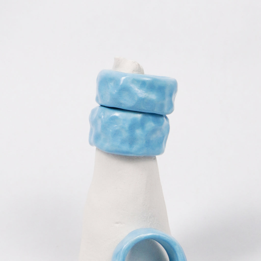 peace-blue-elixir-porcelain-ring-Leap-And-Linger-Product-Rings-by-Nomi-Bui-With-Stand-2nd-Angle
