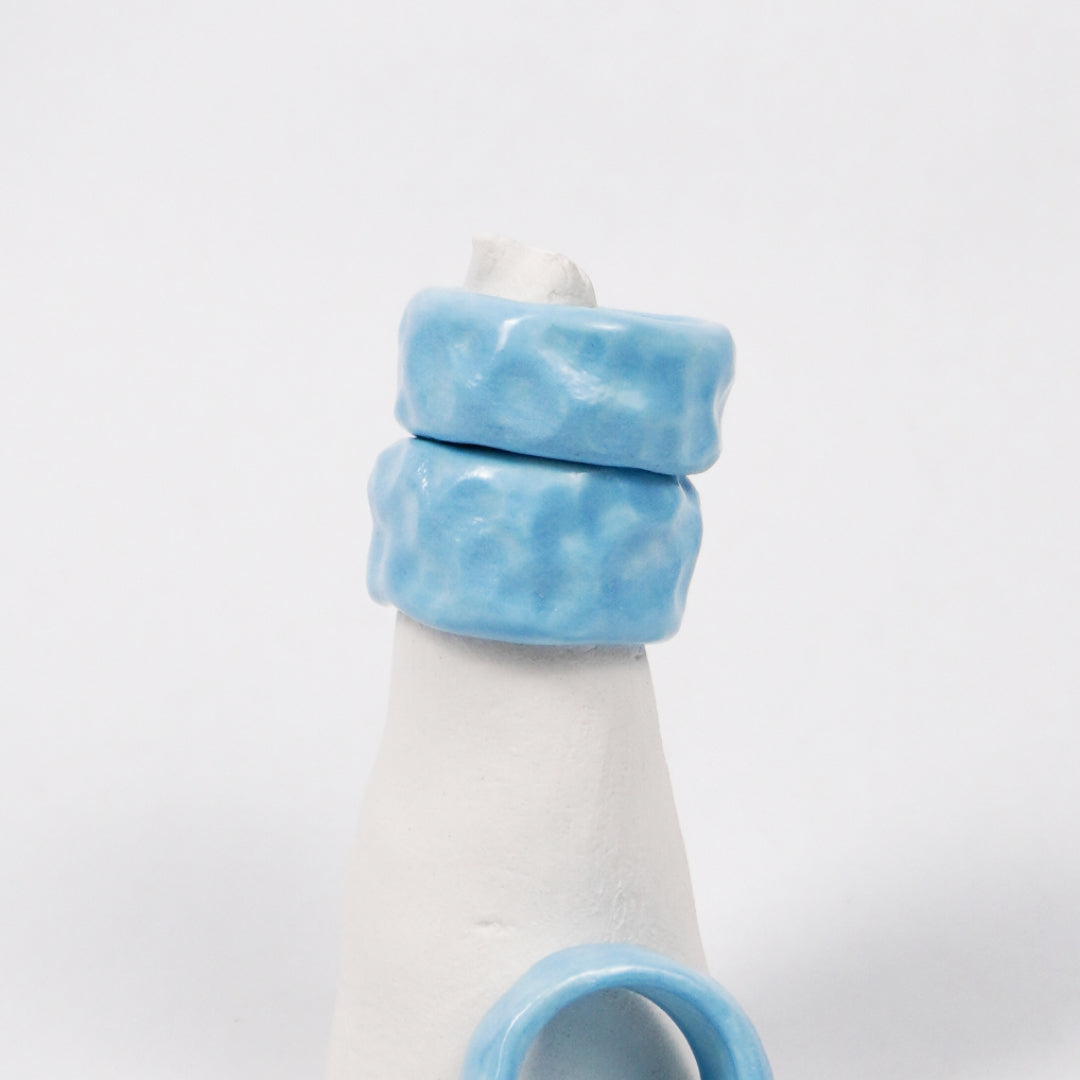 peace-blue-elixir-porcelain-ring-Leap-And-Linger-Product-Rings-by-Nomi-Bui-With-Stand-2nd-Angle