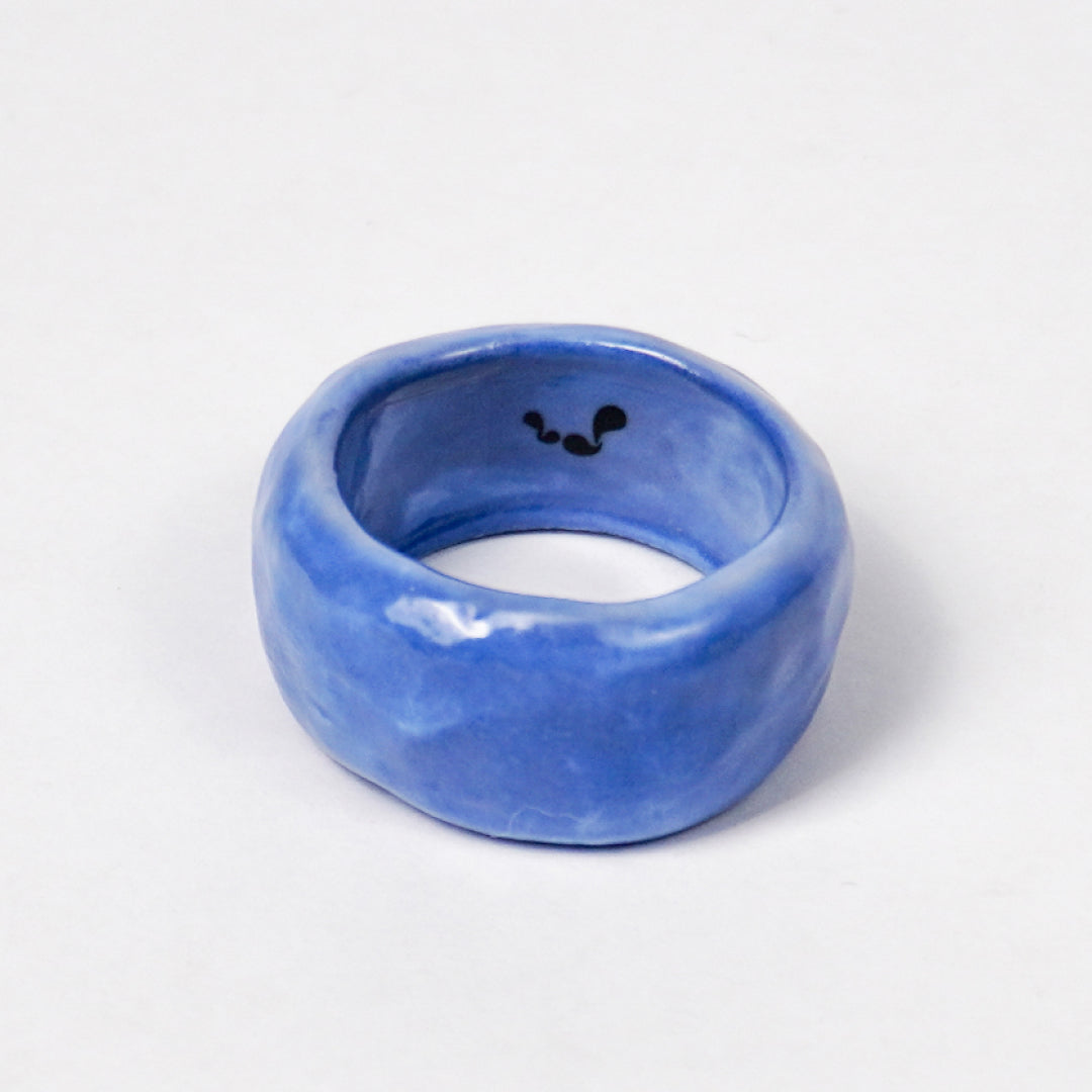 peace-dazzling-blue-ceramic-ring-Leap-And-Linger-Product-Rings-by-Nomi-Bui-1st-Angle