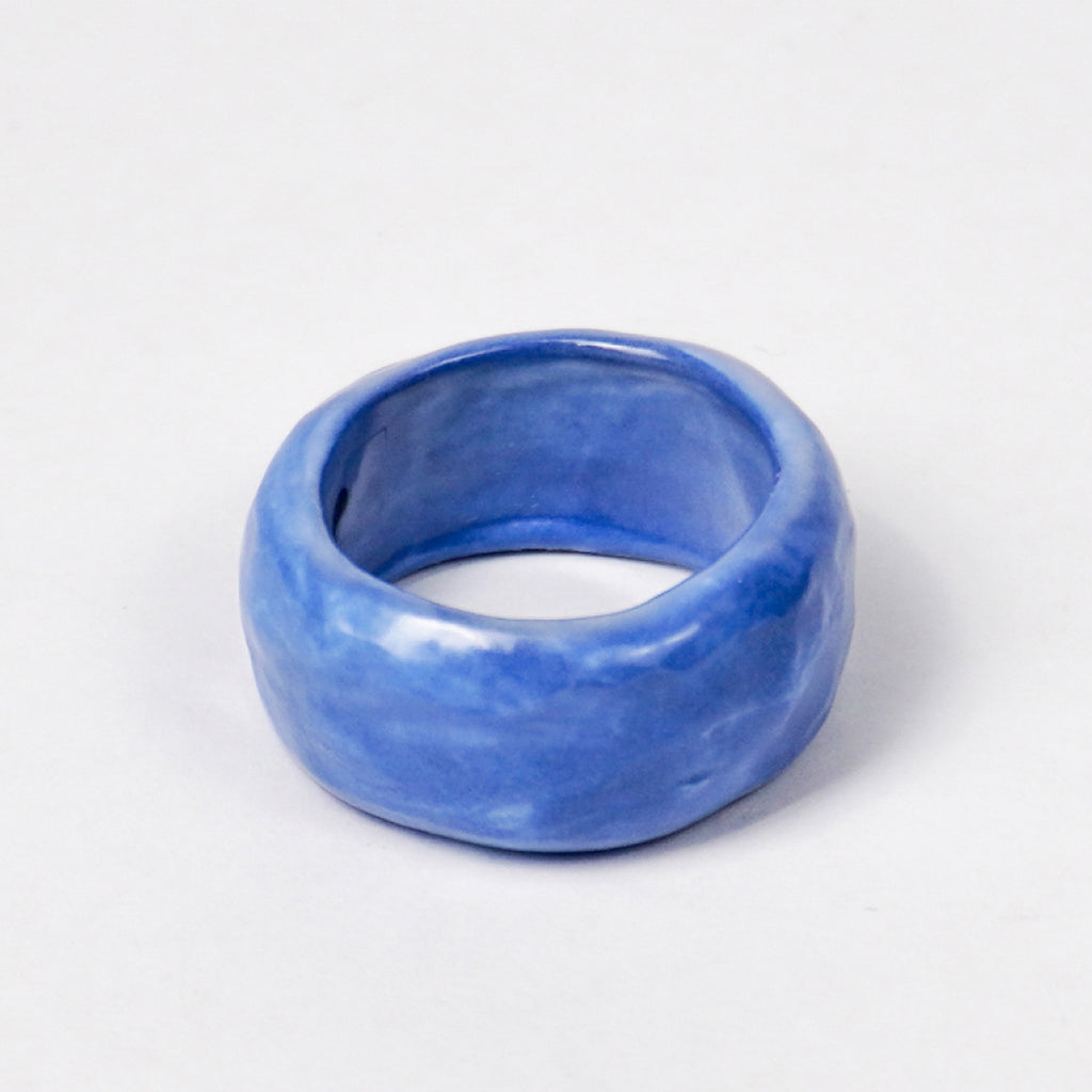 peace-dazzling-blue-ceramic-ring-Leap-And-Linger-Product-Rings-by-Nomi-Bui-3rd-Angle