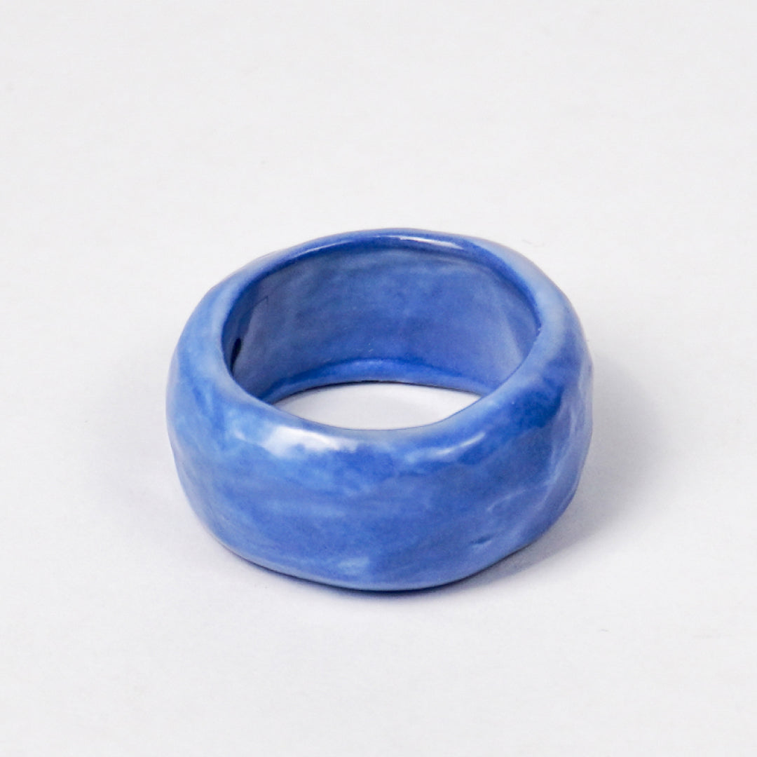 peace-dazzling-blue-ceramic-ring-Leap-And-Linger-Product-Rings-by-Nomi-Bui-3rd-Angle