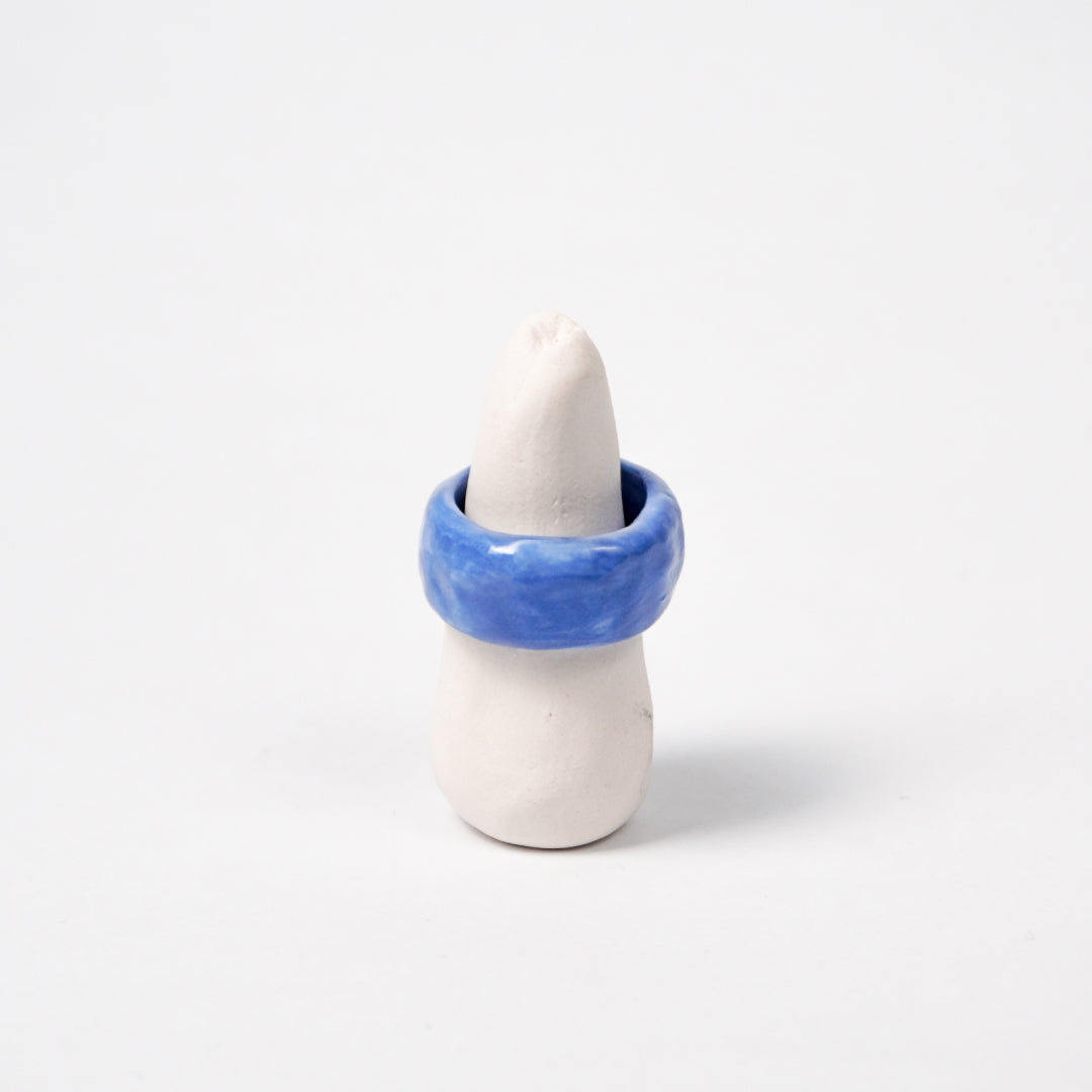 peace-dazzling-blue-porcelain-ring-Leap-And-Linger-Product-Rings-by-Nomi-Bui-With-Stand-1st-Angle