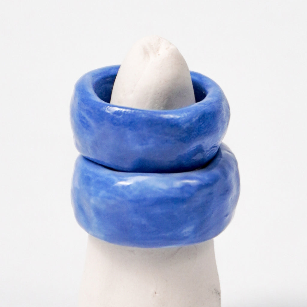 peace-dazzling-blue-porcelain-ring-Leap-And-Linger-Product-Rings-by-Nomi-Bui-With-Stand-2nd-Angle