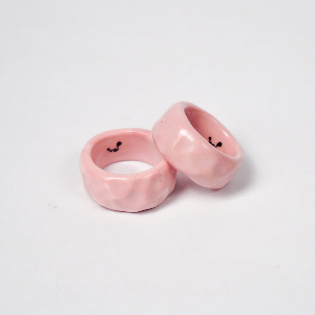 peace-pink-nectar-ceramic-ring-Leap-And-Linger-Product-Rings-by-Nomi-Bui-With-Stand-1st-Angle