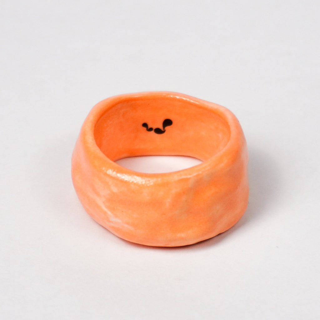 peace-vibrant-orange-ceramic-ring-Leap-And-Linger-Product-Rings-by-Nomi-Bui-1st-Angle