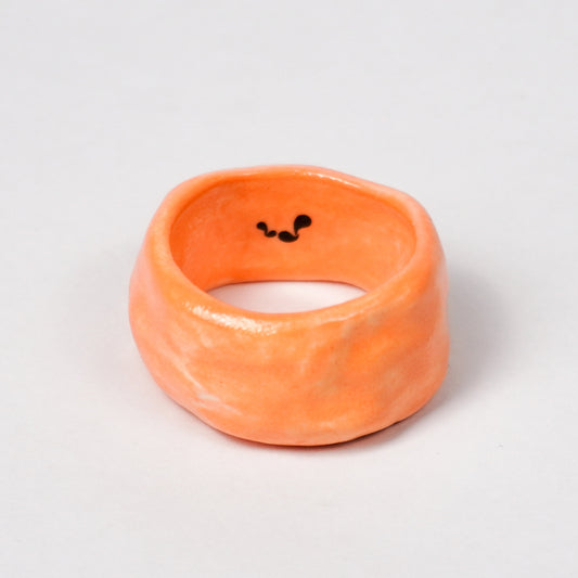 peace-vibrant-orange-ceramic-ring-Leap-And-Linger-Product-Rings-by-Nomi-Bui-1st-Angle