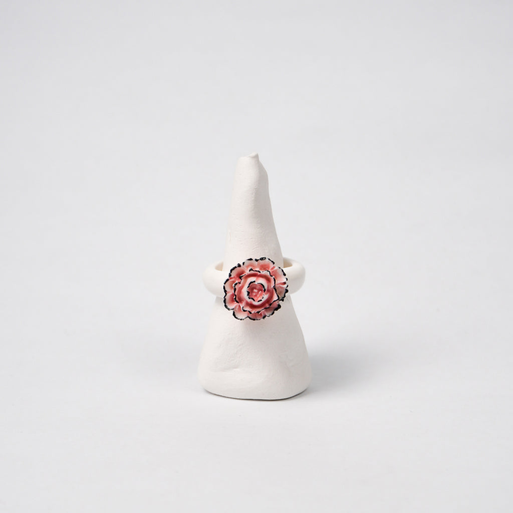 pink-carnation-ceramic-ring-Leap-And-Linger-Product-Rings-by-Nomi-Bui-With-Stand-1st-Angle