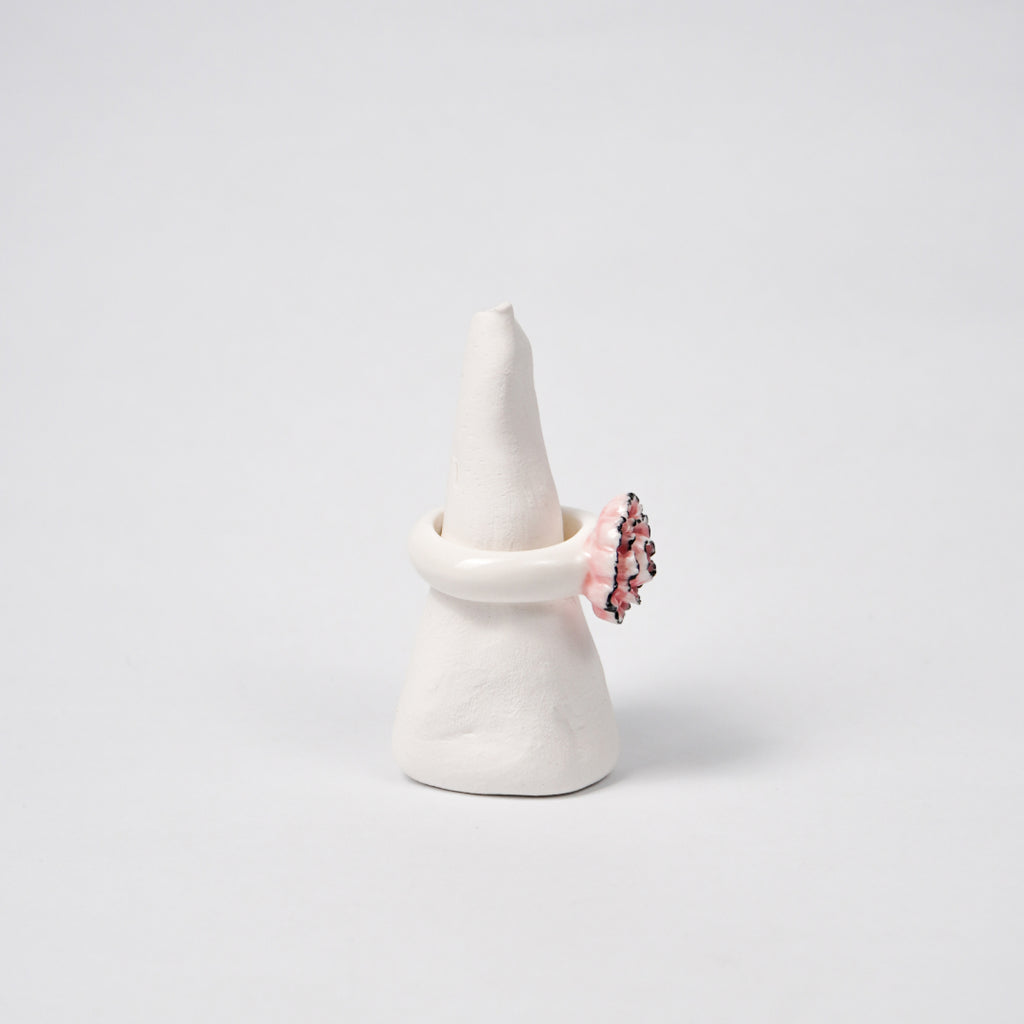 pink-carnation-ceramic-ring-Leap-And-Linger-Product-Rings-by-Nomi-Bui-With-Stand-2nd-Angle