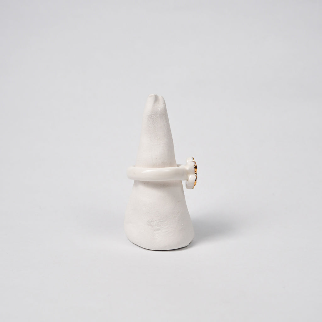 queen-s-gambit-legal-edition-with-24k-gold-ceramic-ring-Leap-And-Linger-Product-Rings-by-Nomi-Bui-With-Stand-2nd-Angle